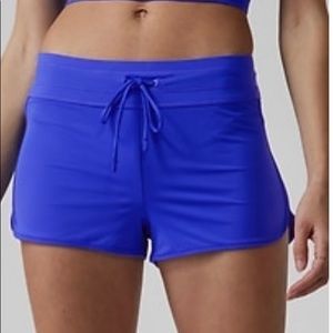 Athleta Surge swim shorts, new with tags, size medium, cerulean